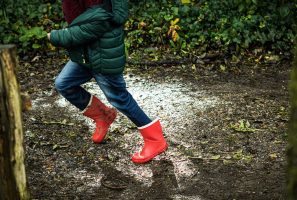 Child muddy puddles