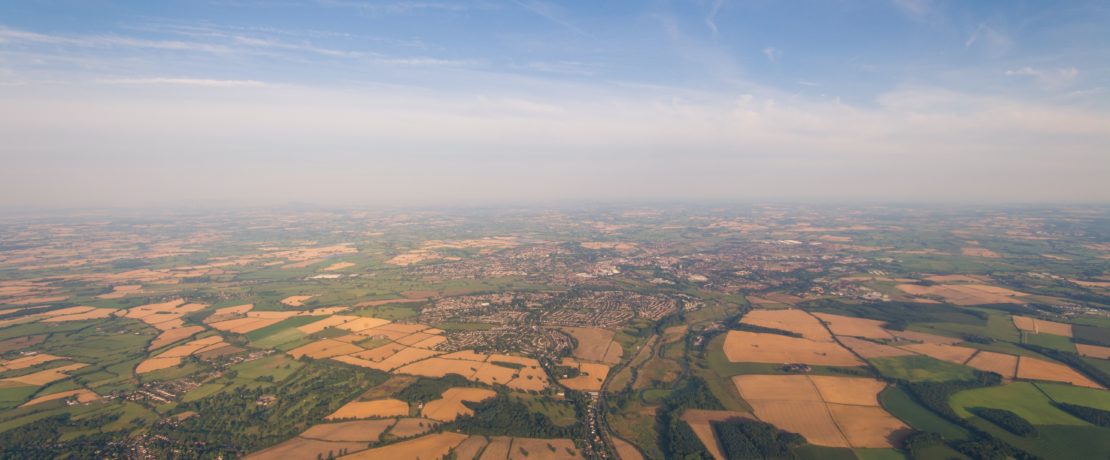 Aerial view photo of fields and hedges