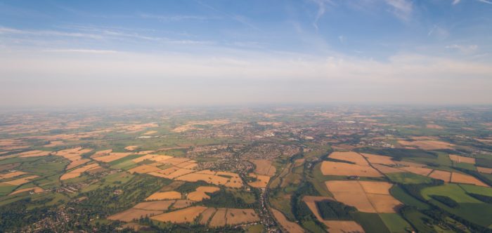 Aerial view photo of fields and hedges
