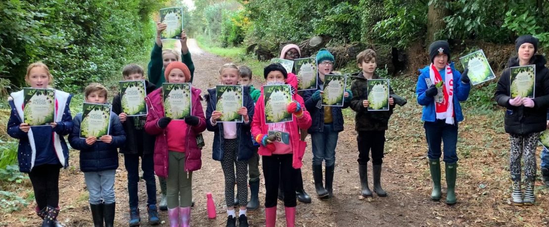 Photo of school children with their hedge pledges.