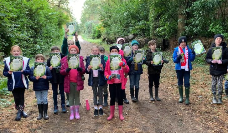 Photo of school children with their hedge pledges.